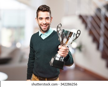 Man Holding A Trophy