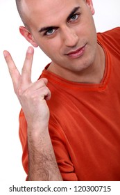 Man Holding Up Two Fingers