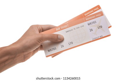 Man is holding two tickets for the plane. Isolated on white background