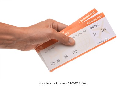 Man Is Holding Two Tickets For The Plane. Isolated On White Background