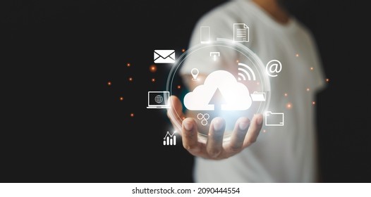 man holding virtual cloud computing storage, network information, technology digital online storage. backup data concept.