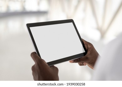 Man Holding A White Screen Digital Tablet