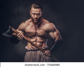 A Man Holds Axe Over Dark Grey Background.