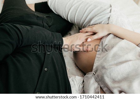 Similar – Baby sleeping on a blanket while her mother looks