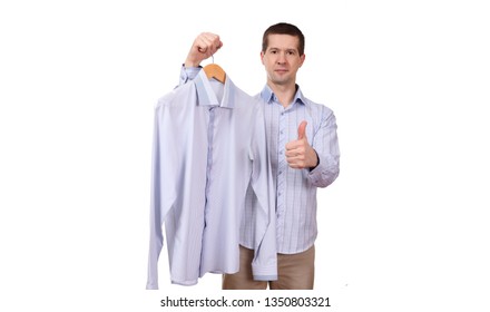 Man Holds Coat Hanger Shirt Ok Stock Photo (Edit Now) 1350803321