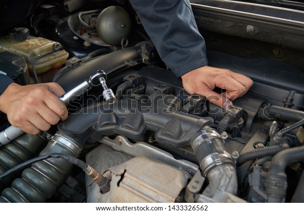 what holds a car engine in place