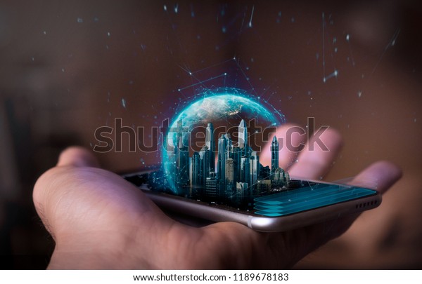 A man holds\
a futuristic phone in his hand, on which appears a futuristic\
metropolitan city with a holographic world. Concept of: business,\
connection, communication,\
people.