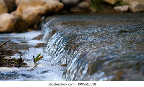 A Man Holds His Hand (washes His Hands) In The Fountain (water), Clearing Them Of Dirt, And Holding The Water Of The Waterfall In The Length Of His Hand. Concert Of: Feel The Water, Slow Motion.