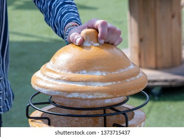 Man Holds The Lid On The Home Smokehouse, Barbecue