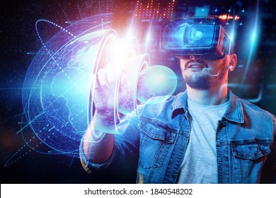 The man holds on his hand a hologram of the earth, the internal structure, the structure of the nucleus. Earth geology concept, new technologies. - Shutterstock ID 1840548202