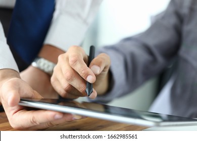 Man Holds Stylus And Puts Signature On Tablet. Signing Documents On An Electronic Touch Device. Ability To Quickly Sign. Handle With Special Silicone Tip. Ouch Touch Surface Monitor