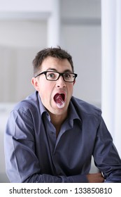 Man In Home Office With Chewing Gum