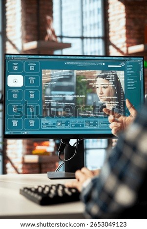 Man in home office using generative artificial intelligence website generating videos using diffusion models. Person having conversation with AI virtual assistant producing clips
