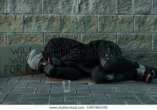 Man Homeless Man Sleeping On Cold Stock Photo 1487406350 | Shutterstock