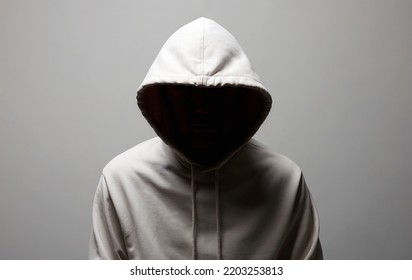 Man in Hood. Boy in white hooded sweatshirt. Incognito person - Shutterstock ID 2203253813
