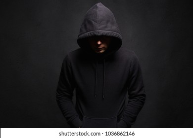 Man in Hood. Dark figure in a hooded sweatshirt. Incognito Boy