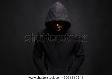 Man in Hood. Dark figure in a hooded sweatshirt. Incognito Boy