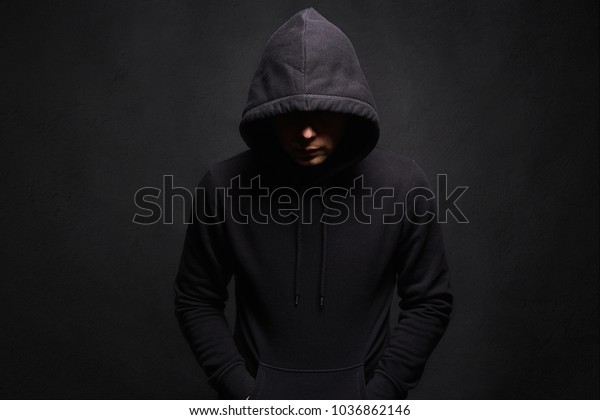 Man in Hood. Dark figure in a hooded sweatshirt.\
Incognito Boy