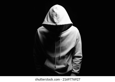 Man in Hood. Person in a hooded sweatshirt. Black and white photo - Shutterstock ID 2169776927