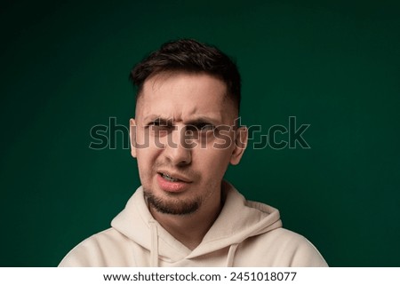 Man in a Hoodie Making a Face