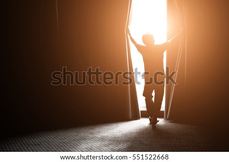 man and hope concept . man opening window curtains