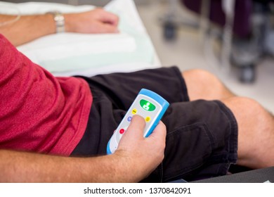 Man In Hospital Getting An Immunoglobulin Infusion With Intravenous Drip