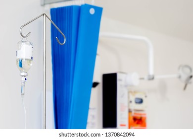 Man In Hospital Getting An Immunoglobulin Infusion With Intravenous Drip