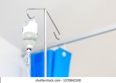 Man In Hospital Getting An Immunoglobulin Infusion With Intravenous Drip