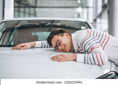 Man Hugging A Car