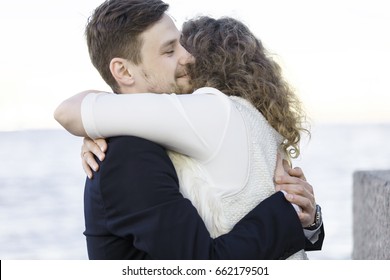 Man Is Hugging A Woman