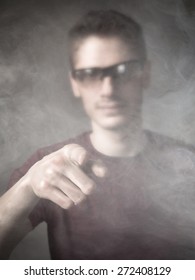 man indicated in a cloud of smoke