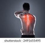 Man, injury and back pain of fitness in studio, anatomy of spine and xray for diagnosis. Red glow, mockup and rear view of person for inflammation of muscle ache, spinal stenosis and gray background.