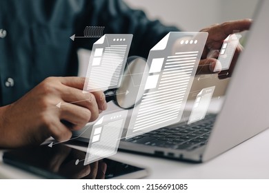 Man inspects paper with magnifying lens. Business analysis, auditing, professional document review, inquiry, and inspection are all concepts that are used in business analysis. - Shutterstock ID 2156691085