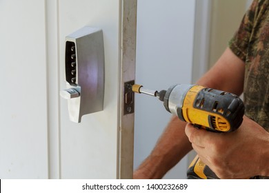 Man installing of the door lock security