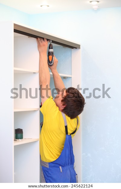 Man Installing Guide Rails Sliding Wardrobe Stock Photo Edit Now