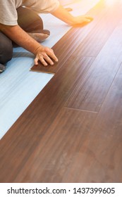 Man Installing New Laminate Wood Flooring Abstract. - Shutterstock ID 1437399605