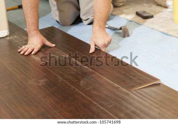 Man Installing New Laminate Wood Flooring Stock Photo Edit