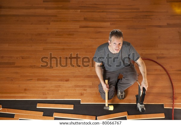 Man Installing Planks Hardwood Floor Stock Photo Edit Now 80066767