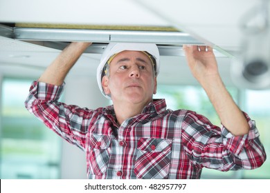 Man Installing Suspended Ceiling