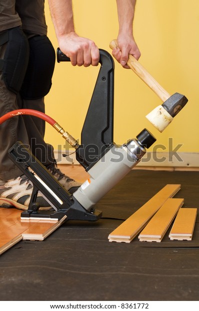 Man Installing Tongue Groove Hardwood Floor Stock Photo Edit Now
