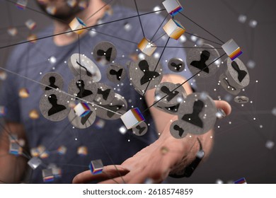 Man Interacting with 3D Network of User Profiles - Powered by Shutterstock - Get 15% off with code: PIKWIZARD15