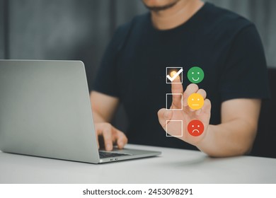 Man interacting with customer satisfaction interface on digital screen.