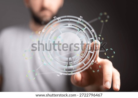 Man Interacting with Futuristic Data Visualization