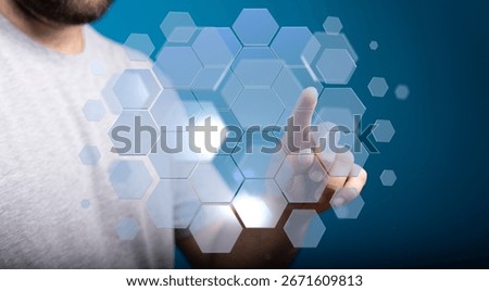 Man Interacting with Hexagon Interface