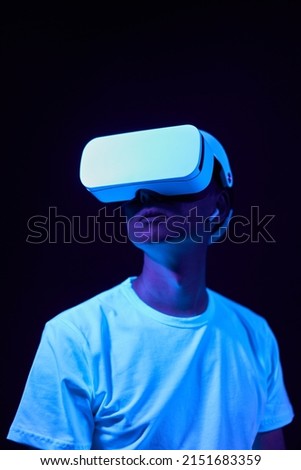 Man interting with virtual reality using vr headset.