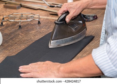 Man Ironing Pants