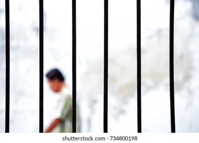 man in jail background and copyspace.