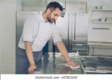 Man Japanese Restaurant Chef Working In The Kitchen