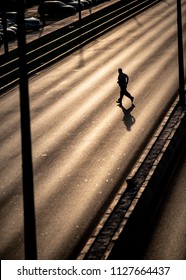 A Man Jaywalking Cross The Road