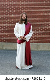 Man In Jesus Christ Robe And Sash